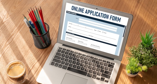 A close-up of an application form for a federal job training program, with highlighted sections indicating required information such as income verification, educational background, and work history.